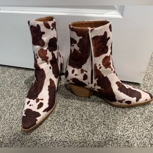 Cow print heeled boots